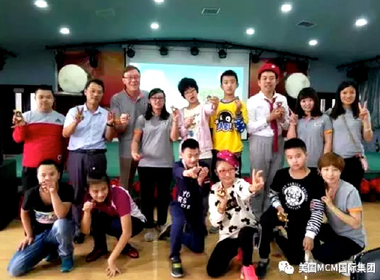 MCM Cares and Qizhi School Group Photo